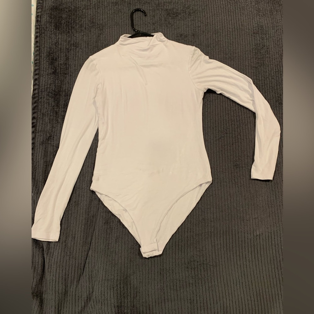 Black and white mock neck body suit